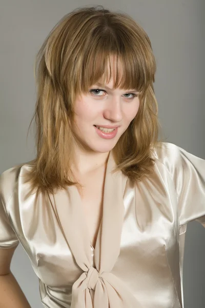 Beautiful girl in a smart dress — Stock Photo, Image