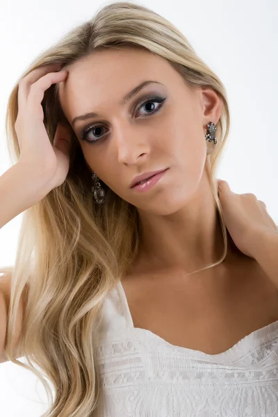 Beautiful blonde in a white dress — Stock Photo, Image
