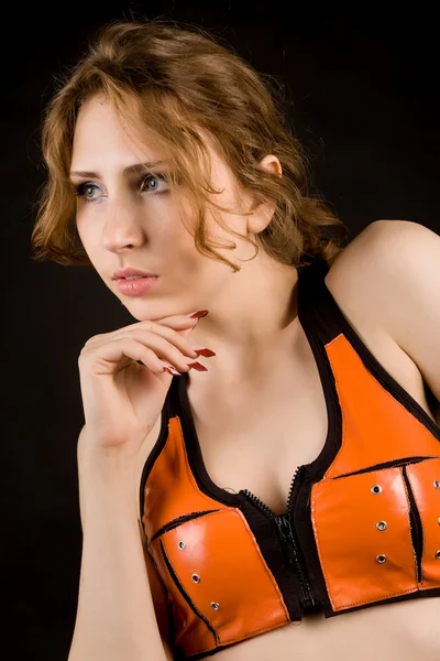 Chica en traje de látex naranja —  Fotos de Stock