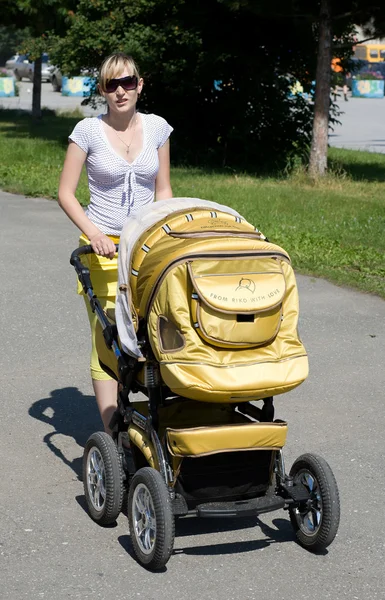 Young mum on walk — Stock Photo, Image