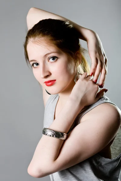 Young girl in a gray blouse — Stock Photo, Image