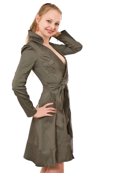 Ung kvinna i en grå kappa — Stockfoto