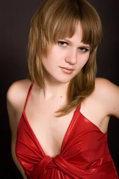 Young girl in a red dress — Stock Photo, Image