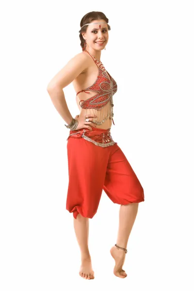 Girl in a red dress dancing — Stock Photo, Image