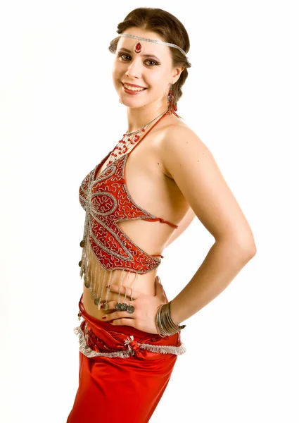 Girl in a red dress dancing — Stock Photo, Image