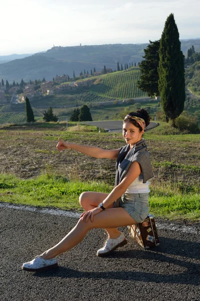 Hitchhiker young girl — Stock Photo, Image