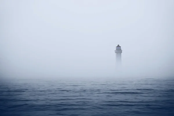 Lighthouse in fog — Stock Photo, Image