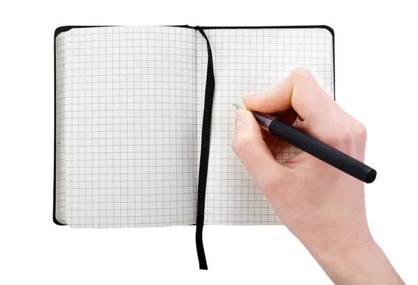 Note pad with pen and hand — Stock Photo, Image