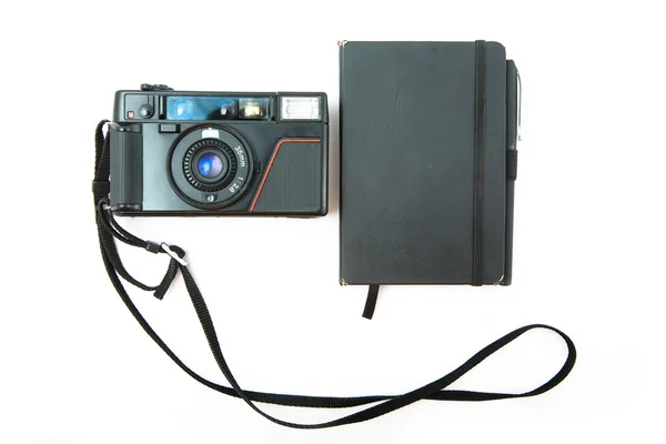 Vintage film kamera och note pad — Stockfoto