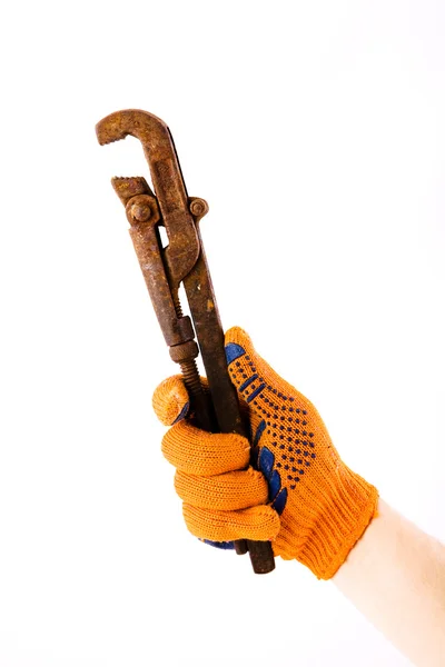 Adjustable Wrench in hand — Stock Photo, Image