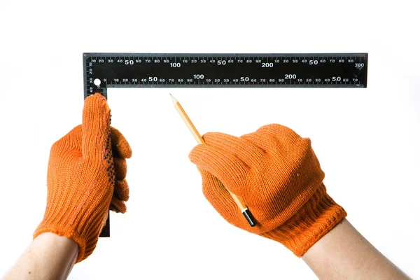 Steel Ruler in hand — Stock Photo, Image