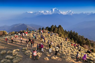 People looking for sunrise at Himalayas clipart