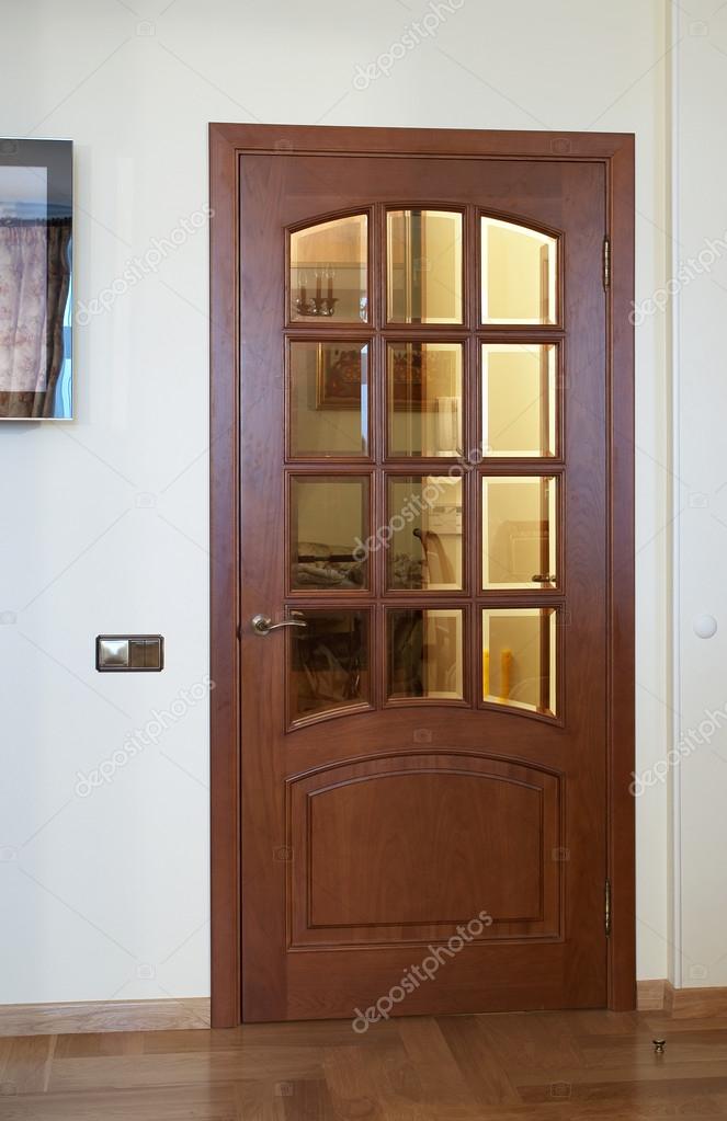 The Modern Interior Of The Apartment With Doors From A Natural T