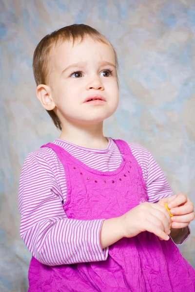 Dziecko w różowej sukience — Zdjęcie stockowe