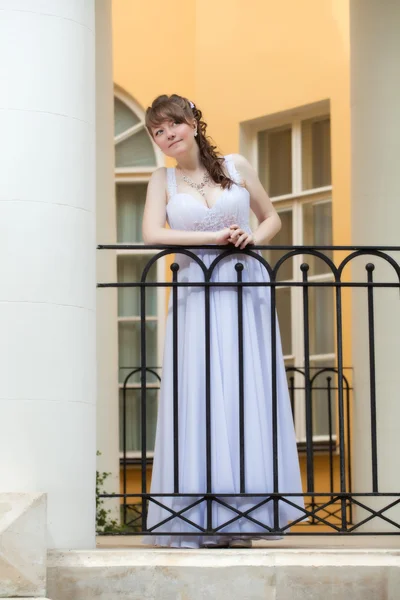 Bride on the balcony waiting for a loved one — Stock Photo, Image