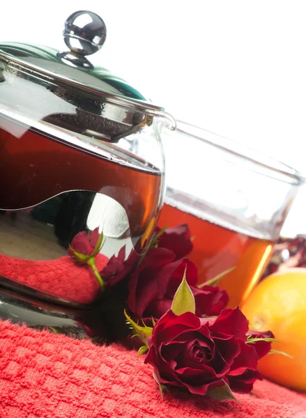 Scalded teapot and cup of tea — Stock Photo, Image