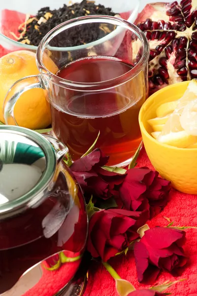 Scalded teapot and cup of tea — Stock Photo, Image