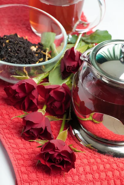 Scalded teapot and cup of tea — Stock Photo, Image