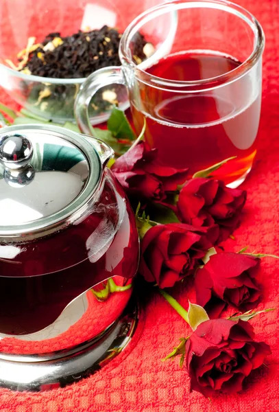 Scalded teapot and cup of tea — Stock Photo, Image