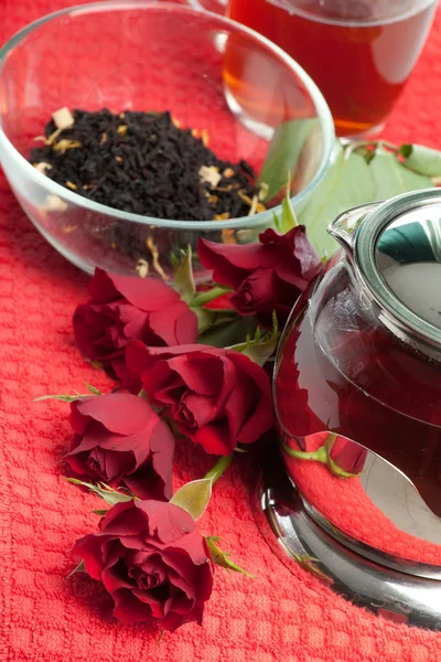 Scalded teapot and cup of tea — Stock Photo, Image