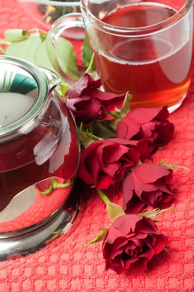 Scalded teapot and cup of tea — Stock Photo, Image