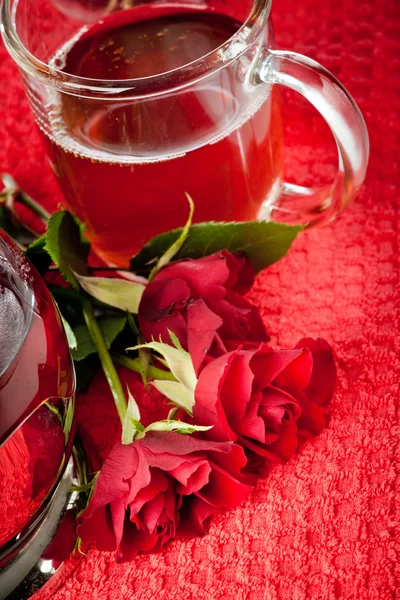 Scalded teapot and cup of tea — Stock Photo, Image