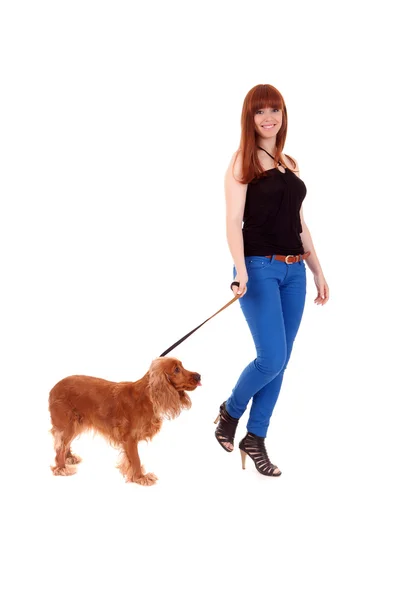 Woman walk with a dog Stock Photo