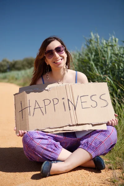 Woman holding card — Stock Photo, Image