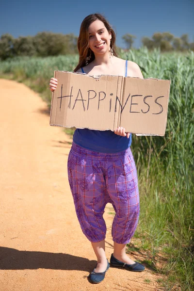 Woman holding card — Stock Photo, Image