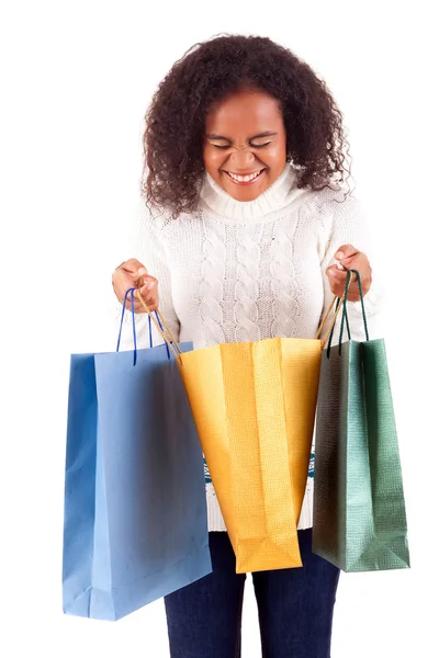 Junge und schöne Frau mit Einkaufstaschen — Stockfoto