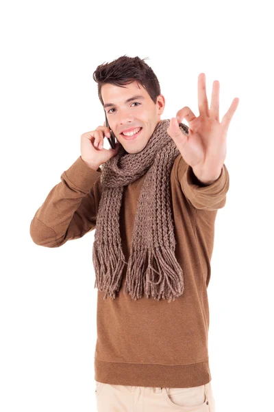 Studio foto van een gelukkige jongen gekleed voor de winter — Stockfoto