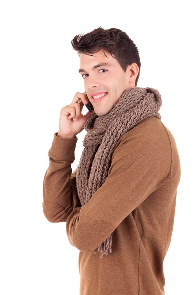 Imagen del estudio de un joven feliz vestido para el invierno —  Fotos de Stock