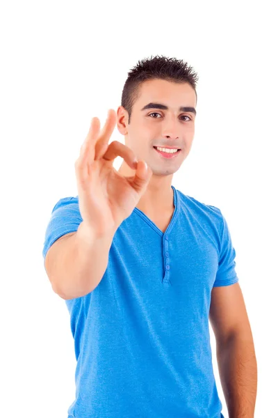 Studio picture of a young handsome man signaling ok — Stock Photo, Image