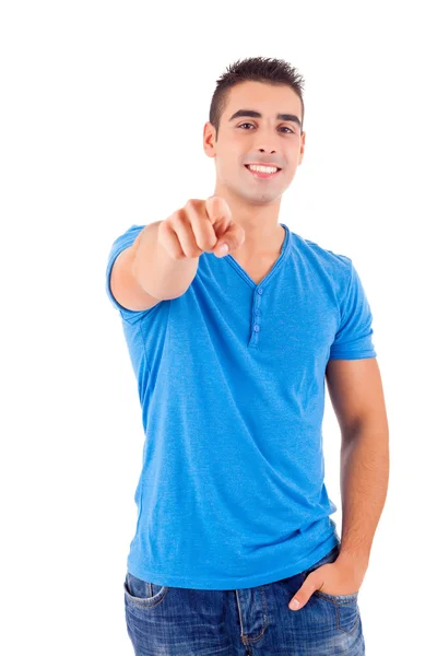 Studio shot of a handsome young man pointing forward — Stock Photo, Image