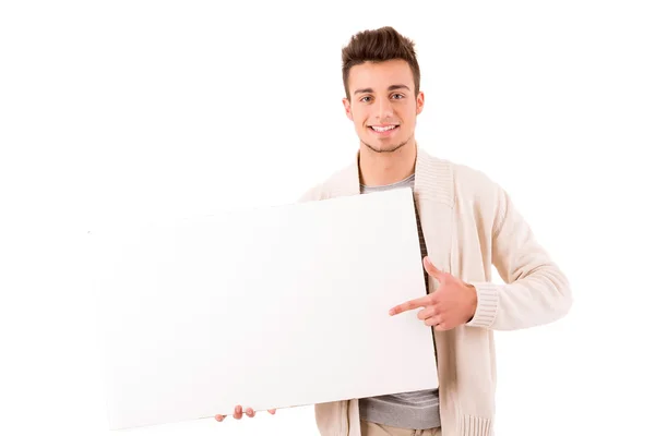 A young casual man holding a white card — Stock Photo, Image