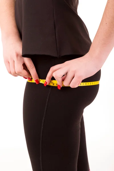 Woman measuring her waist metric tape — Stock Photo, Image