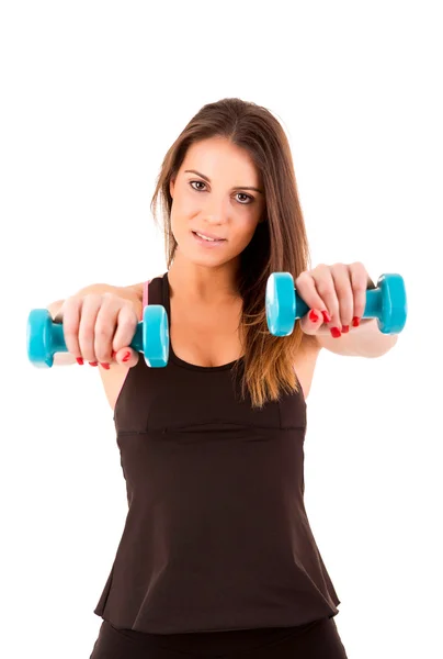 Joven hermosa mujer haciendo ejercicios con pesas — Foto de Stock