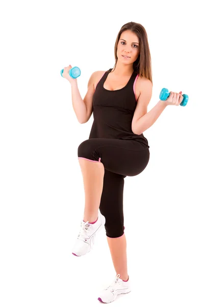 Joven hermosa mujer haciendo ejercicios con pesas — Foto de Stock