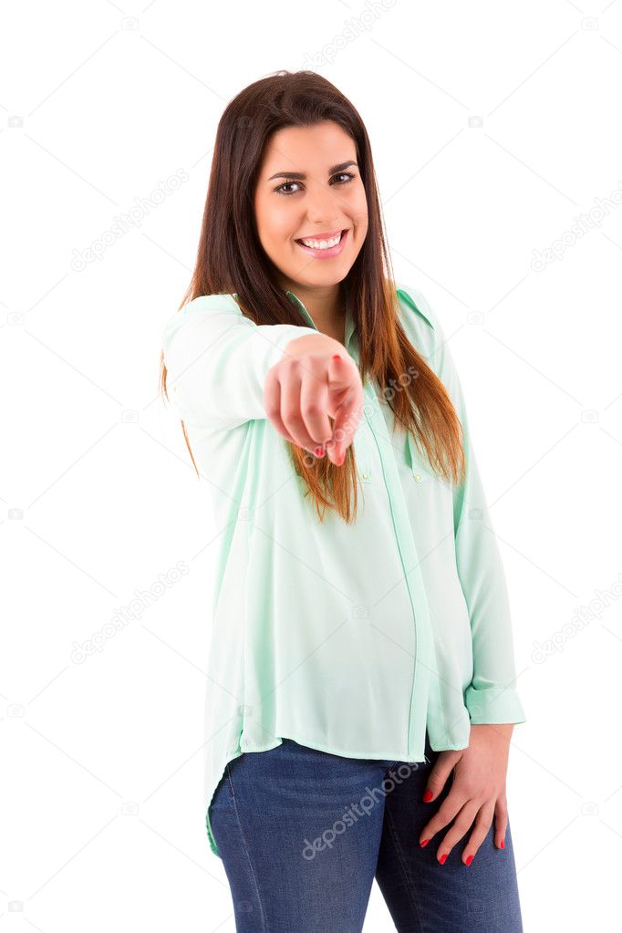 Young beautiful woman pointing at you