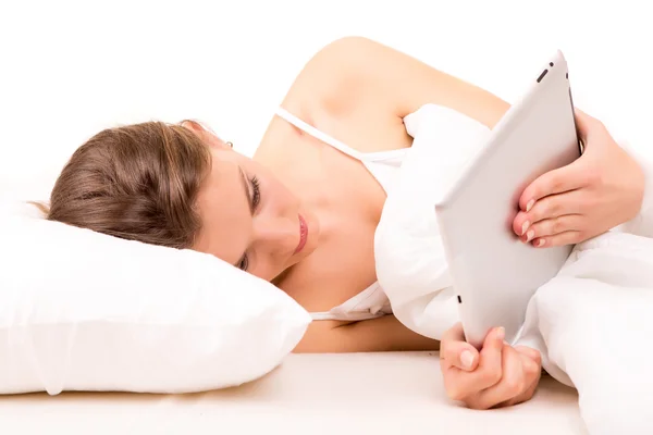 Frau im Bett — Stockfoto