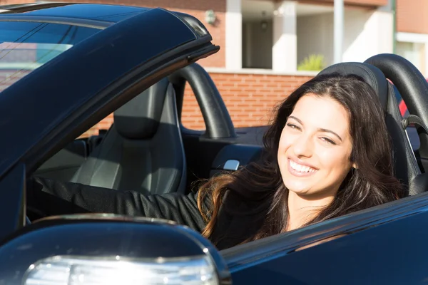 Business woman in sports car — Stock Photo, Image