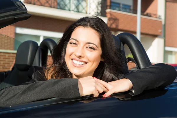 Business woman in sports car — Stock Photo, Image