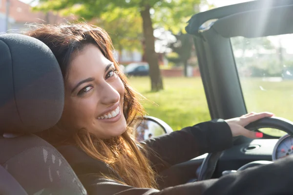 Business woman in sports car — Stock Photo, Image