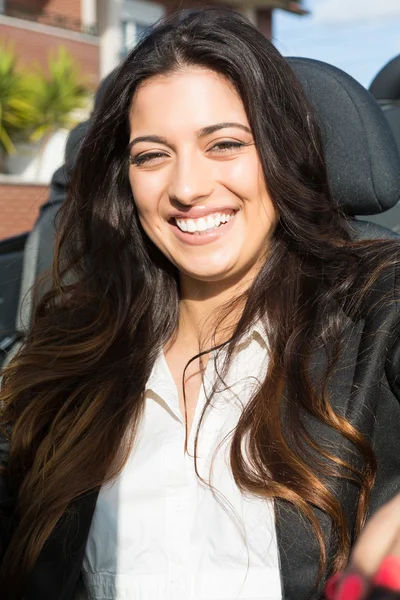 Business woman in sports car — Stock Photo, Image