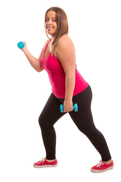 Mujer grande haciendo ejercicio — Foto de Stock