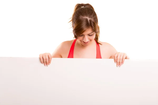 Fitness woman holding blank board — Stock Photo, Image