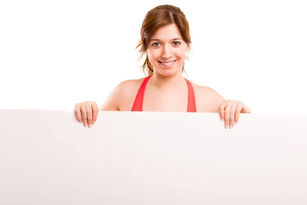 Fitness žena hospodářství prázdná deska — Stock fotografie