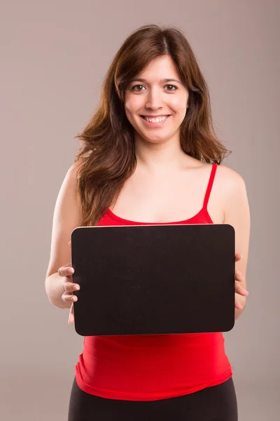 Woman with black board — Stock Photo, Image