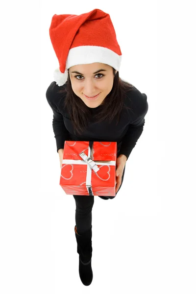 Beautiful young girl holding a christmas gift Stock Photo