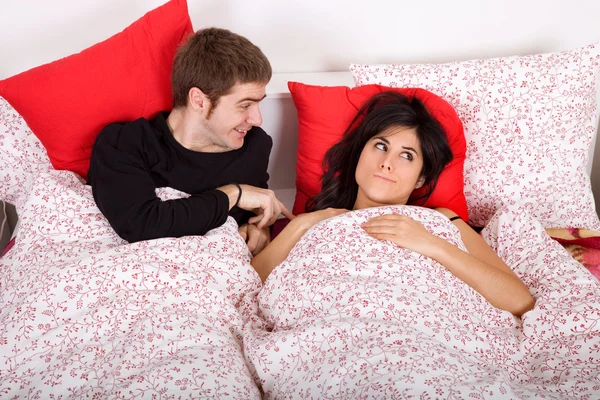 Pareja en la cama — Foto de Stock